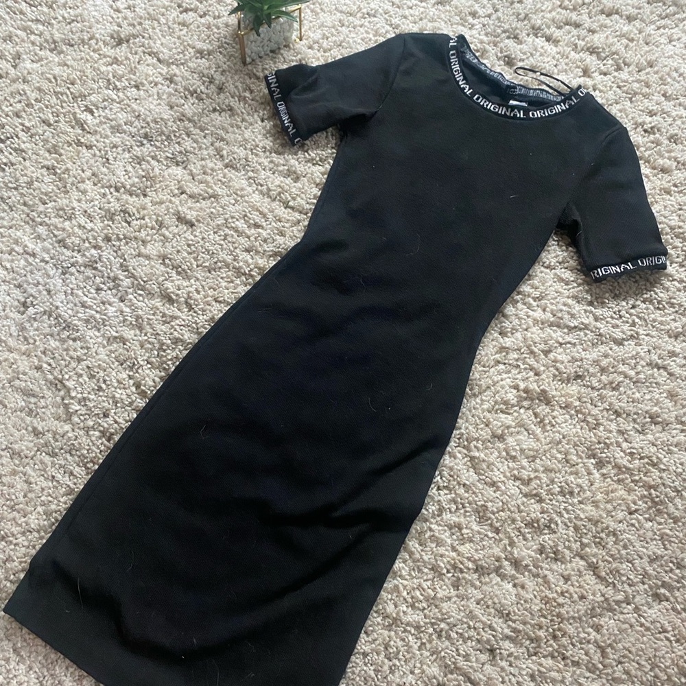 Black tight fitting party going out street dress
